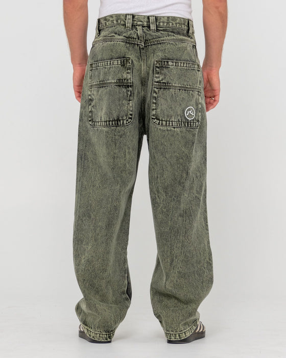 man-wearing-r-dot-baggy-jean-in-overdyed-green