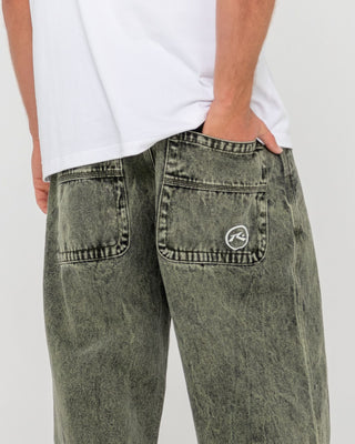 Man wearing R Dot Baggy Jean in Overdyed Green