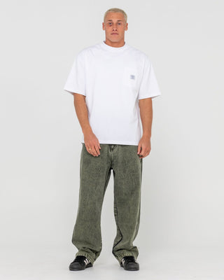 Man wearing R Dot Baggy Jean in Overdyed Green