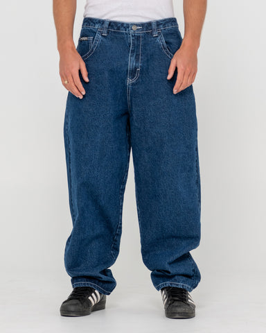 Man wearing Trusty Tapered Denim Jean in Blue