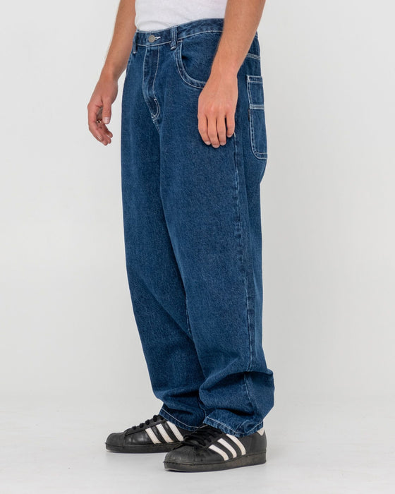 man-wearing-trusty-tapered-denim-jean-in-deep-sea-blue