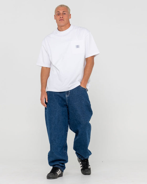 man-wearing-trusty-tapered-denim-jean-in-deep-sea-blue