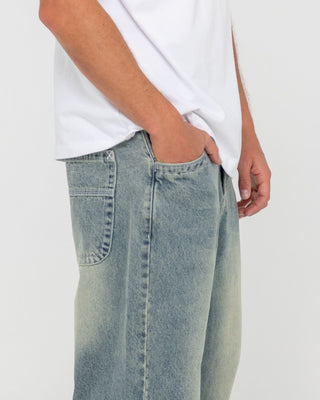 Man wearing Trusty Tapered Denim Jean in Dirty Dawg