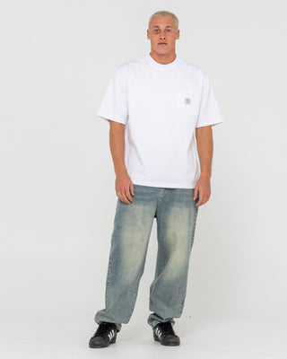 Man wearing Trusty Tapered Denim Jean in Dirty Dawg