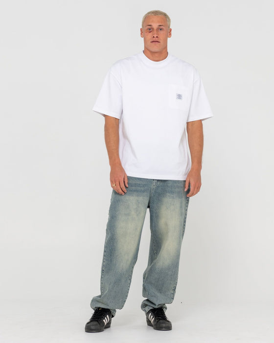 man-wearing-trusty-tapered-denim-jean-in-dirty-dawg