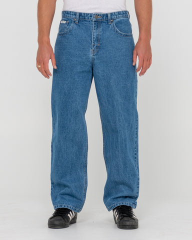 Man wearing Lucifer Loose Jean - Middy Blue in Blue