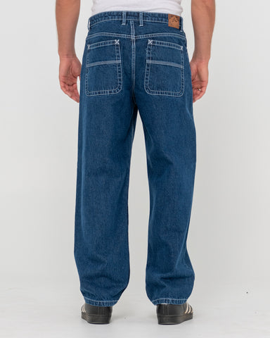 Man wearing Lucifer Loose Jean - Deep Sea Blue in Blue