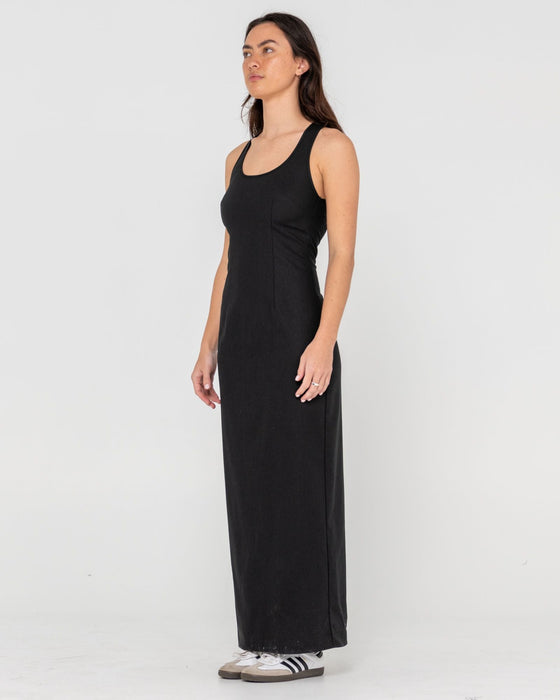 woman-wearing-cross-back-maxi-dress-in-black