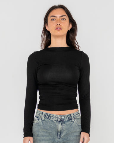 Woman wearing Plain Jane Ruched Long Sleeve Top in Black