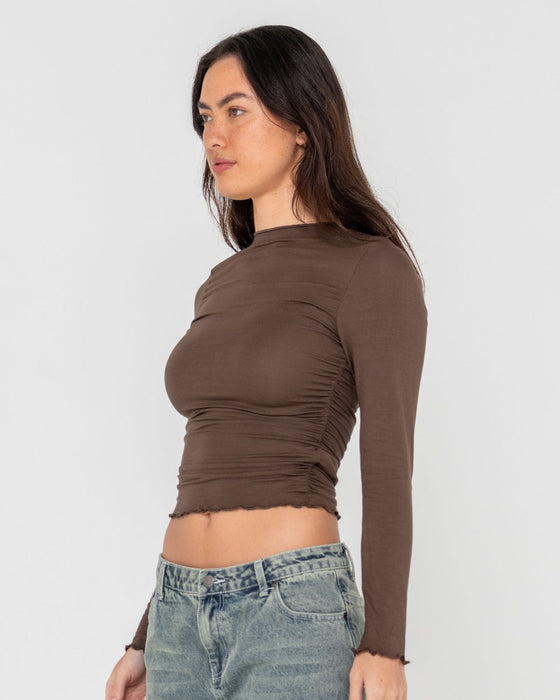 woman-wearing-plain-jane-ruched-long-sleeve-top-in-java
