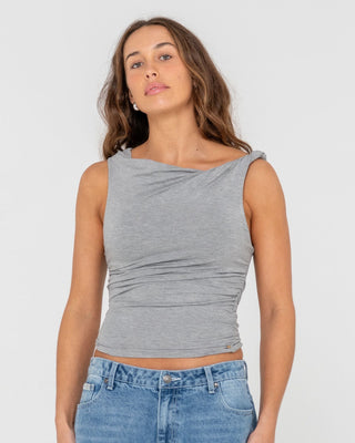 Woman wearing Nightfall Asymmetric Skimmer Top in Ecru Marle