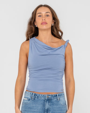 Woman wearing Nightfall Asymmetric Skimmer Top in Blue