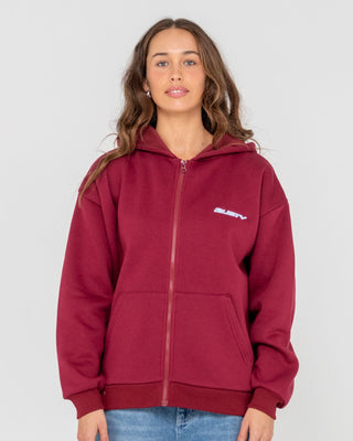 Woman wearing Flip Mommy Oversize Zip Hooded Fleece in Rhubarb