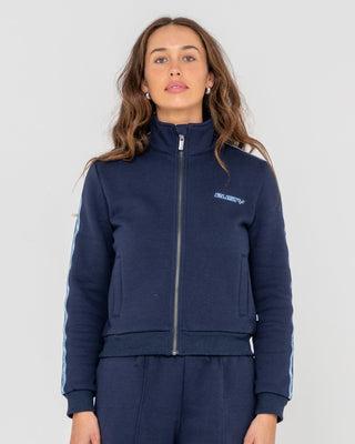 Woman wearing Midnights Long Sleeve Zip Through Fleece in Atlantic Blue