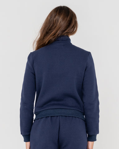 Woman wearing Midnights Long Sleeve Zip Through Fleece in Blue