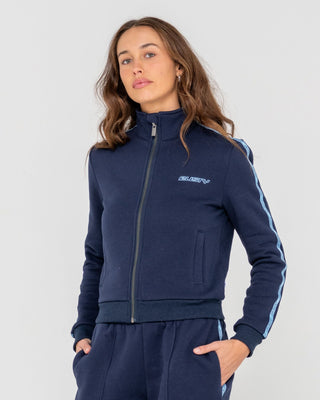 Woman wearing Midnights Long Sleeve Zip Through Fleece in Atlantic Blue