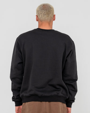 Man wearing Vital 2.0 Rusty Crew Neck Fleece in Black