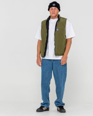 Man wearing Rippa Puffer Vest in Black