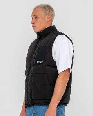 Man wearing Rippa Puffer Vest in Black