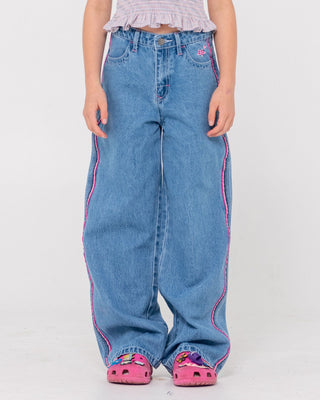 Girl wearing Flip Girl Low Rise Jean in Middy Blue / Pink