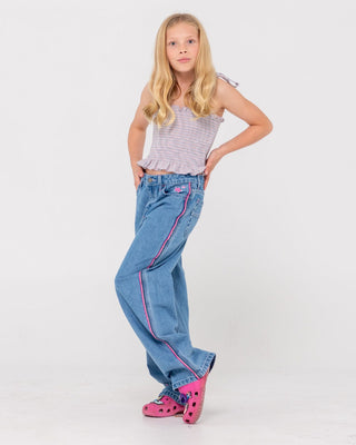 Girl wearing Flip Girl Low Rise Jean in Middy Blue / Pink