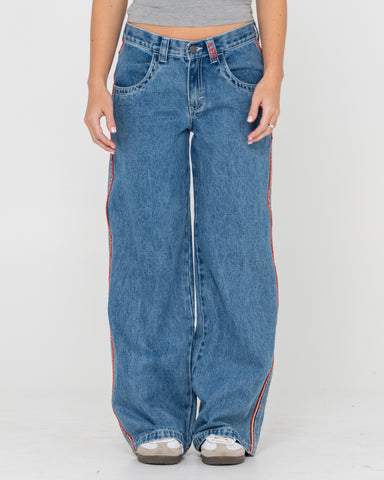 Woman wearing Flip Mommy Low Rise Wide Leg Denim Jean in Blue