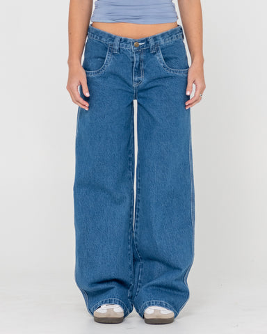 Woman wearing Flip Mommy Low Rise Tapeless Denim Jean in Blue