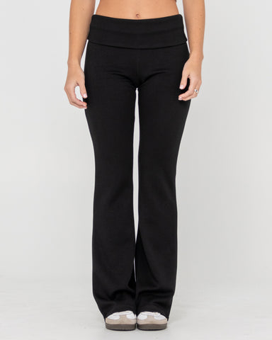 Woman wearing Hilton Low Rise Bootleg Track Pant in Black