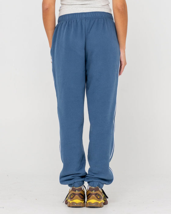 woman-wearing-south-cuffed-low-rise-track-pant-in-atlantic-blue
