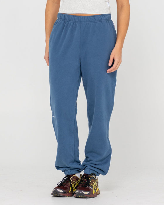 woman-wearing-south-cuffed-low-rise-track-pant-in-atlantic-blue