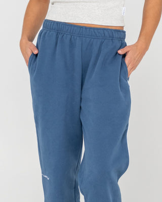 Woman wearing South Cuffed Low Rise Track Pant in Atlantic Blue