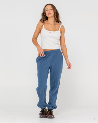 Woman wearing South Cuffed Low Rise Track Pant in Atlantic Blue