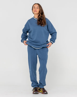 Woman wearing South Cuffed Low Rise Track Pant in Atlantic Blue