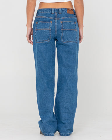 Woman wearing Suzy Straight Low Rise Jean in Blue