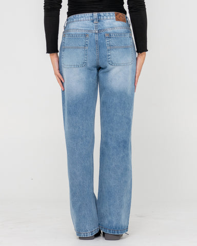 Woman wearing Suzy Straight Low Rise Jean in Blue