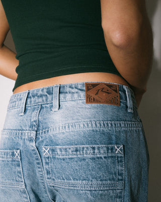 Woman wearing Bethany Baggy Low Rise Jean in Blasted Middy Blue