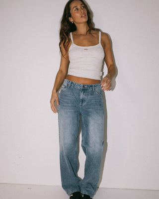 Woman wearing Bethany Baggy Low Rise Jean in Blasted Middy Blue