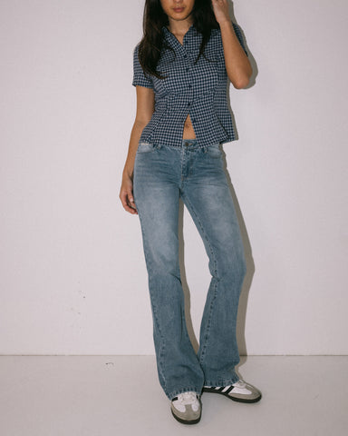 Woman wearing Betty Bootleg Low Rise Jean in Blue