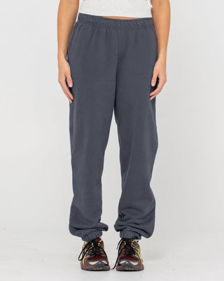 Woman wearing Rusty Essentials Low Rise Track Pant in Carbon