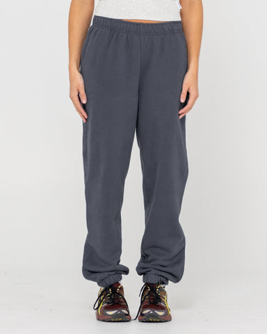 Woman wearing Rusty Essentials Low Rise Track Pant in Grey