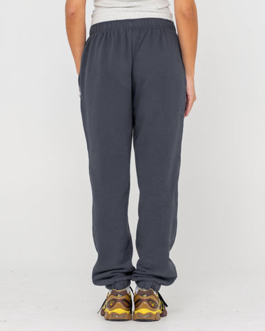 Woman wearing Rusty Essentials Low Rise Track Pant in Grey