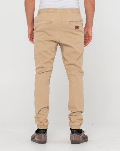 Man wearing Hook Out Elastic Pant in Brown