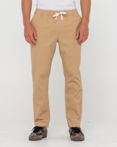 Man wearing Mid Boy Straight Fit Elastic Pant in Brown