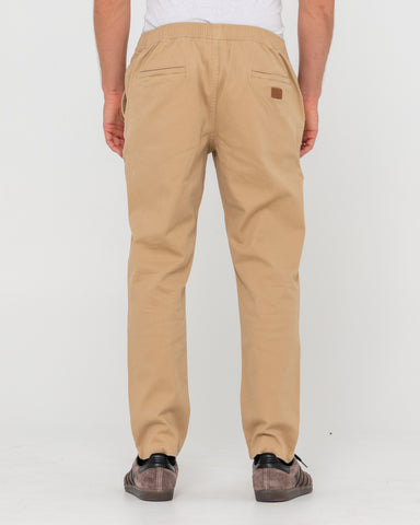 Man wearing Mid Boy Straight Fit Elastic Pant in Brown