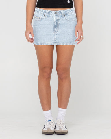 Woman wearing Mavericks Low Rise Denim Mini Skirt in Blue