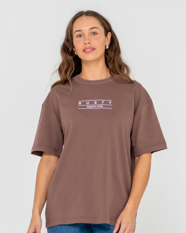 Woman wearing Rusty Essentials Oversize Tee in Brown