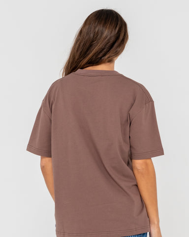 Woman wearing Rusty Essentials Oversize Tee in Brown