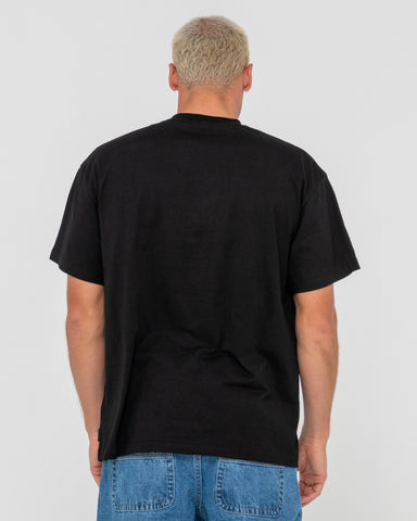 Man wearing Vital Rusty Short Sleeve Tee in Black