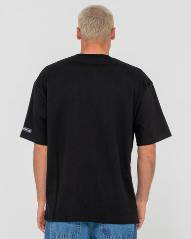 Man wearing Restricted Short Sleeve Tee in Black