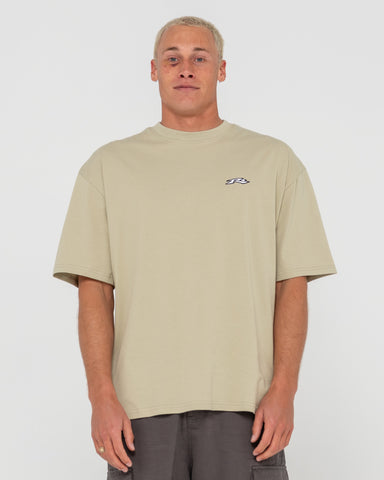 Man wearing Registered Short Sleeve Tee in Brown